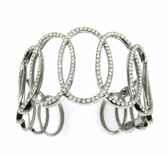 Statement bracelet with intersecting diamond ovals in sterling silver.