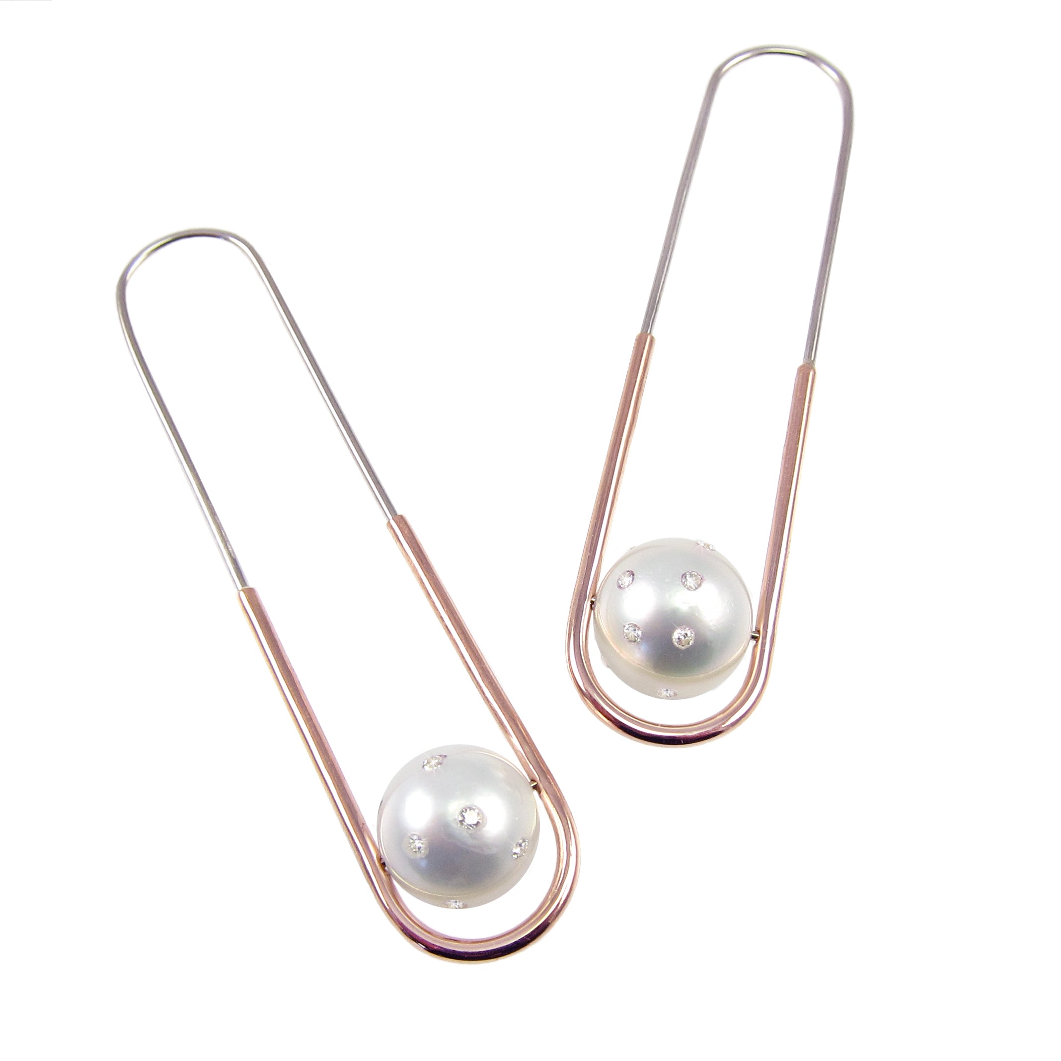 Stunning architectural earring in rose and white gold with single South Sea and diamond studded pearl.