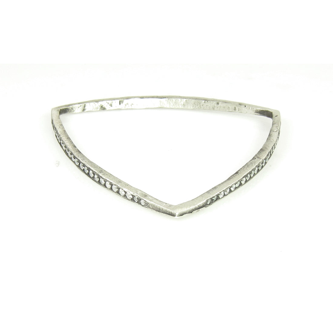 A diamond bangle in the shape of a triangle makes a unique, whimsical statement.